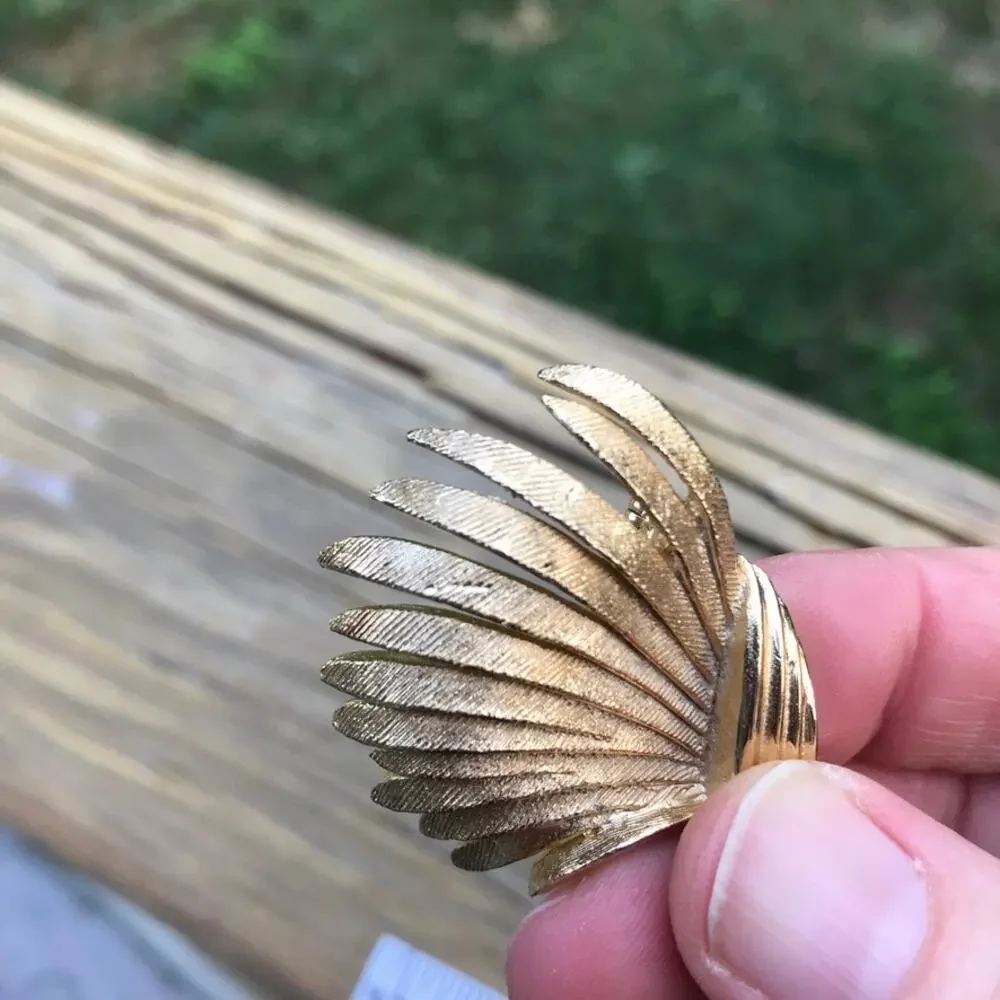 Estate signed CORO brushed gold tone textural swirl brooch / pin